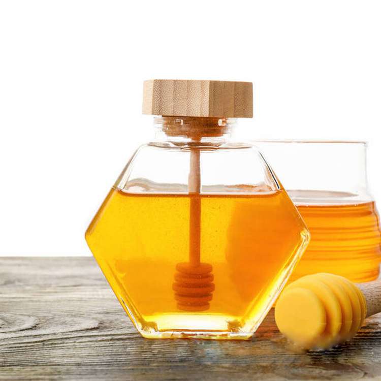 Hexagonal honey glass bottle with stirring rod and wooden cover sealed jar honey packing bottle