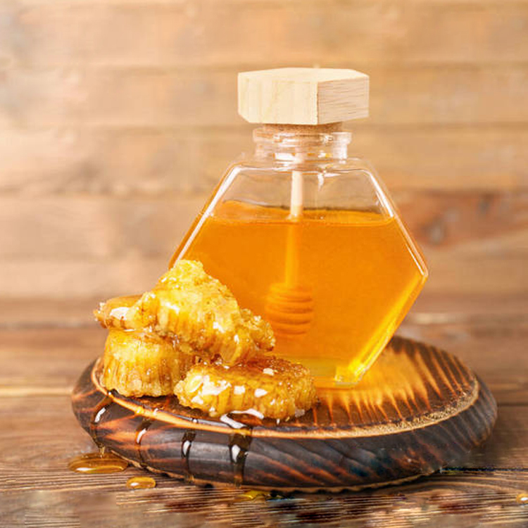 Hexagonal honey glass bottle with stirring rod and wooden cover sealed jar honey packing bottle