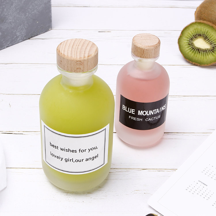 High Quality 250ml Frosted Glass Beverage Bottle For Coffee Liquor With Wood Cork Top