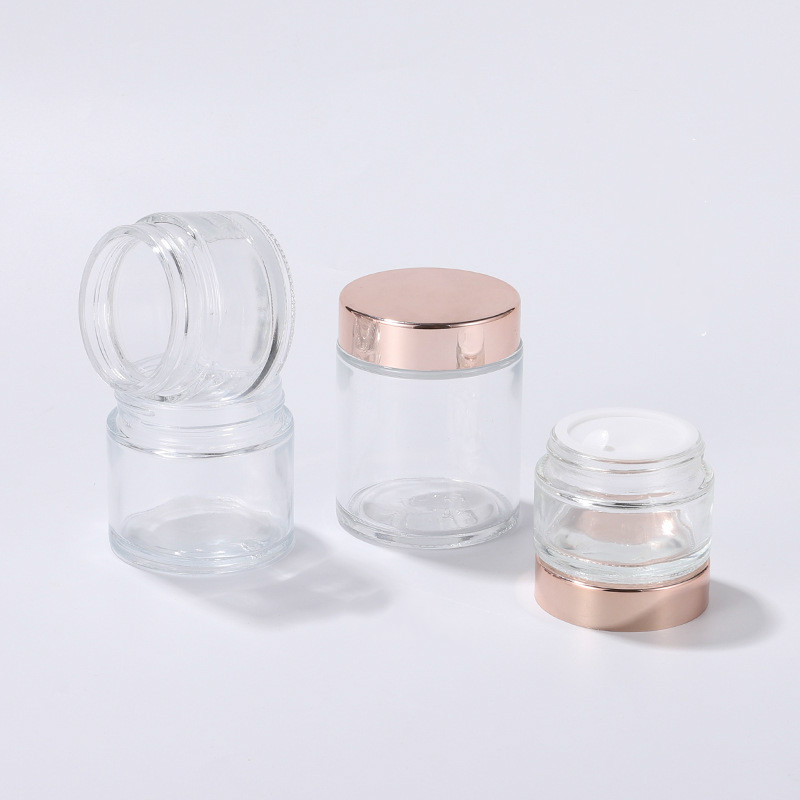 High Quality 30ml 1oz Fancy Clear Cosmetic Cream Glass Jar With Rose Gold Cap