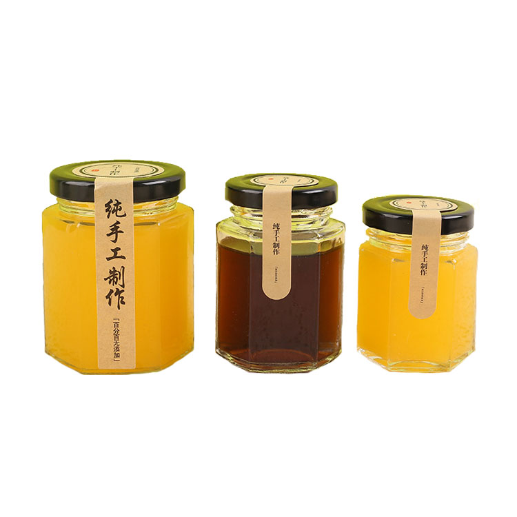 High Quality 6oz 180ml storage bottles Hexagon shape honey jam glass jar with mental black lids
