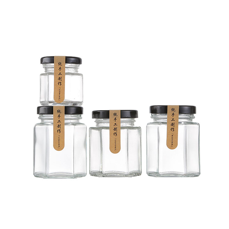 High Quality 6oz 180ml storage bottles Hexagon shape honey jam glass jar with mental black lids
