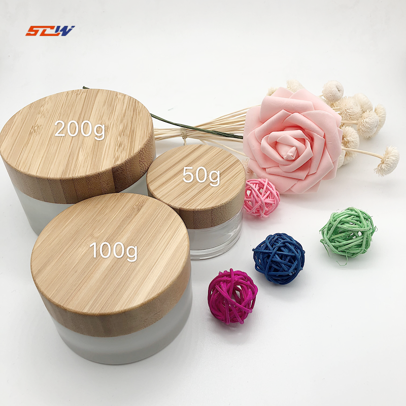 High Quality Glass Jar with Bamboo Cap 50g 100g 200g Cream Jar Clear and Frosted Glass Cream Jar