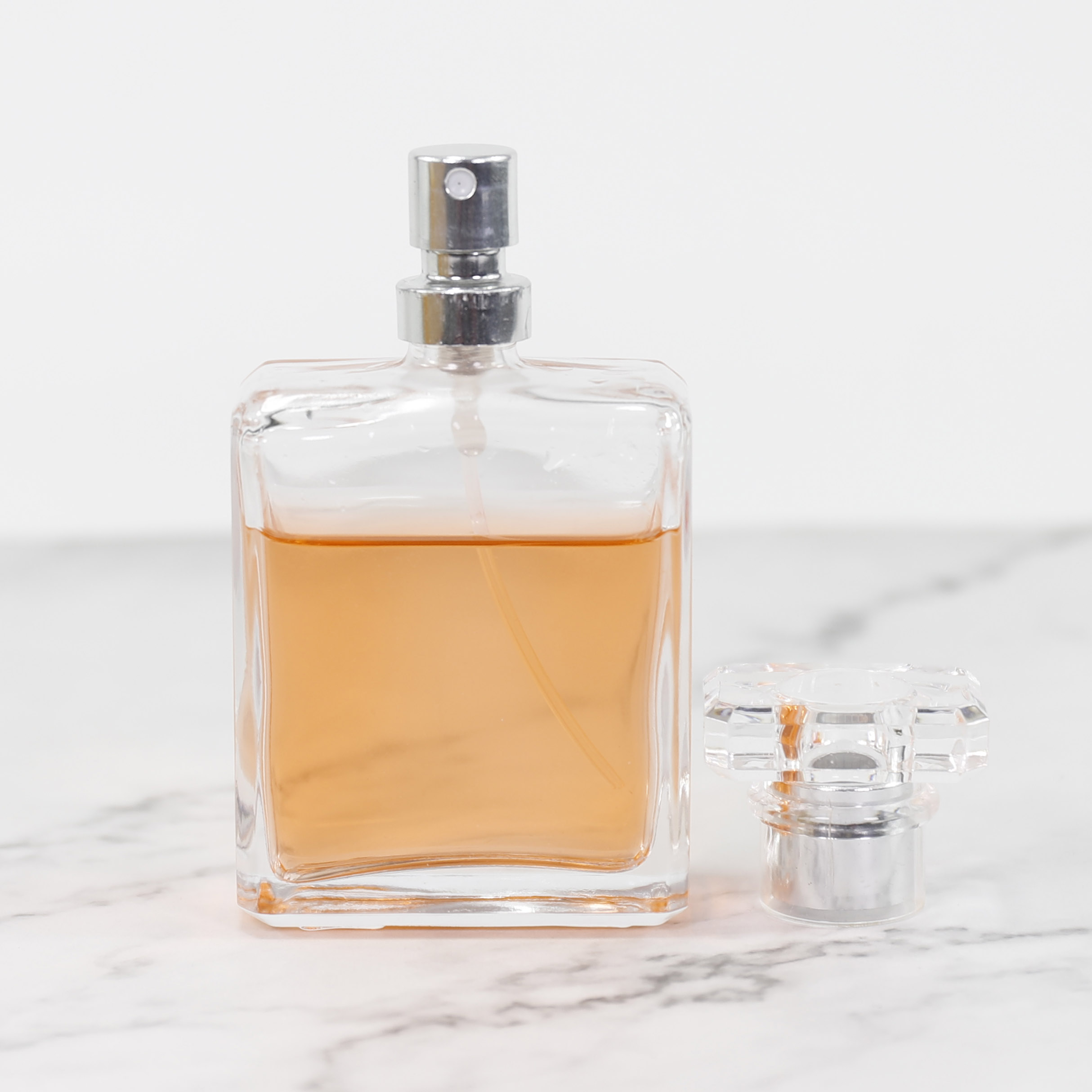 High Quality Square Crimp Custom Logo Perfume Spray Glass Bottle 50ml 100ml