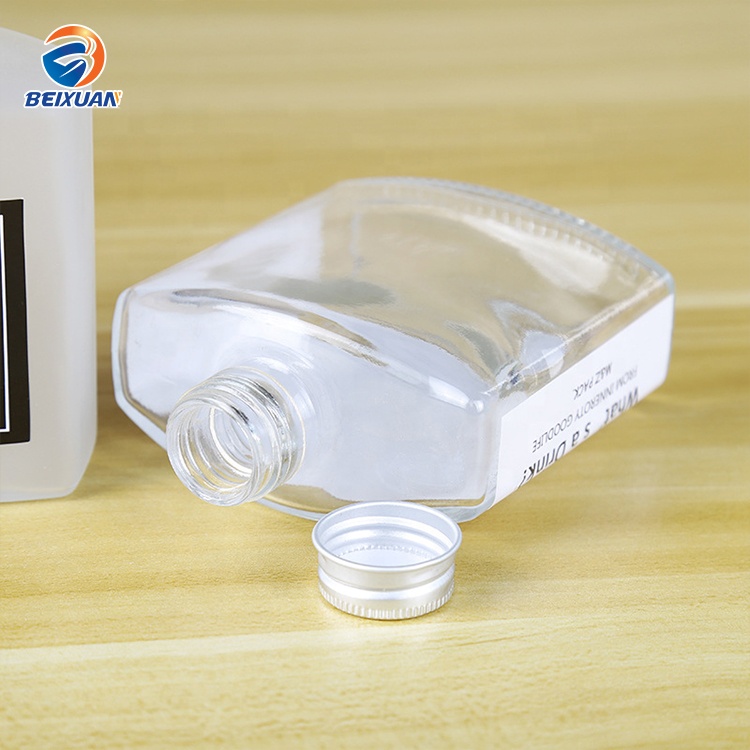 High Quality Wholesale 200ml Mini Beverage Packing Wine Flat Glass Bottle with Aluminium Lid for Whisky Vodka
