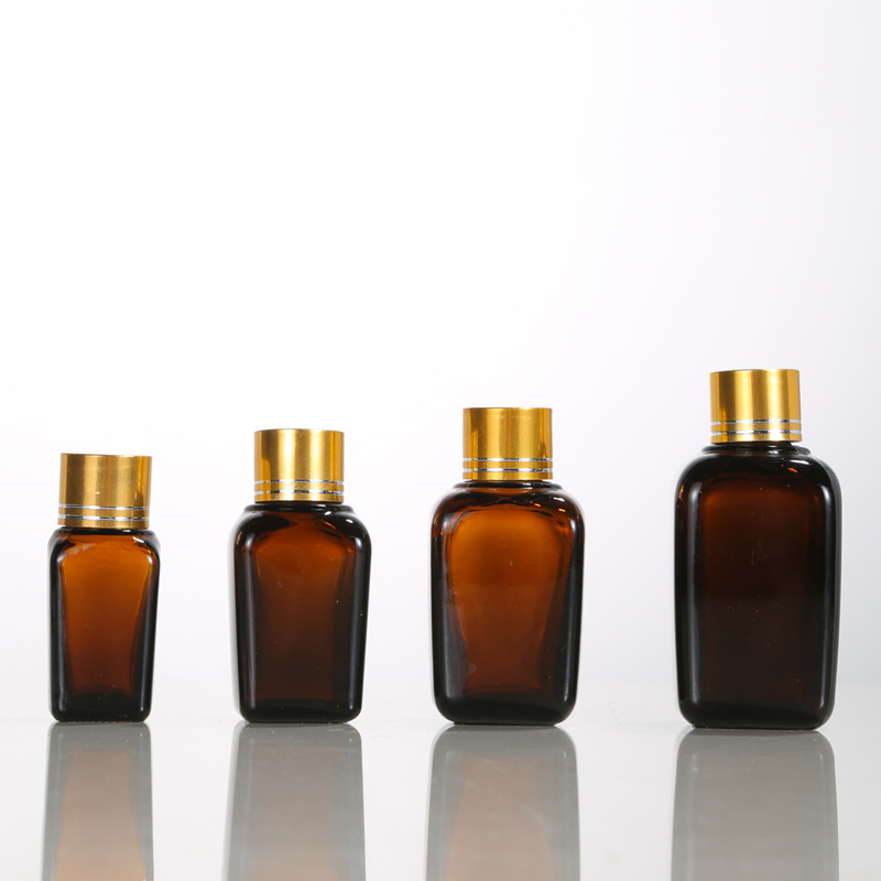 High Quality amber rectangular bottle with black spray pumps for skincare cosmetic packaging glass bottle