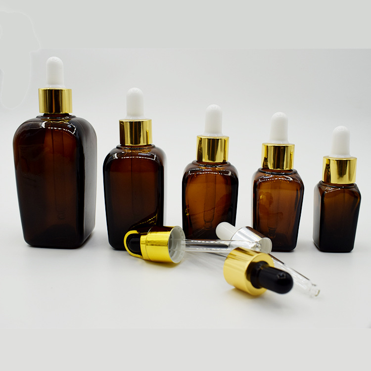 High Quality amber rectangular bottle with black spray pumps for skincare cosmetic packaging glass bottle