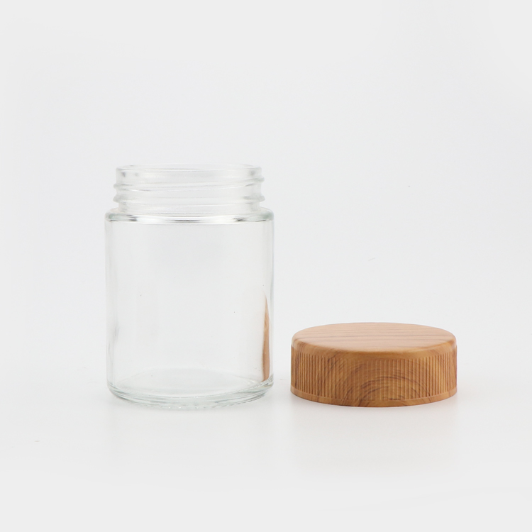 High end 1 2 3 4 oz empty round shape spice storage childproof food container clear honey glass jar with wooden lid