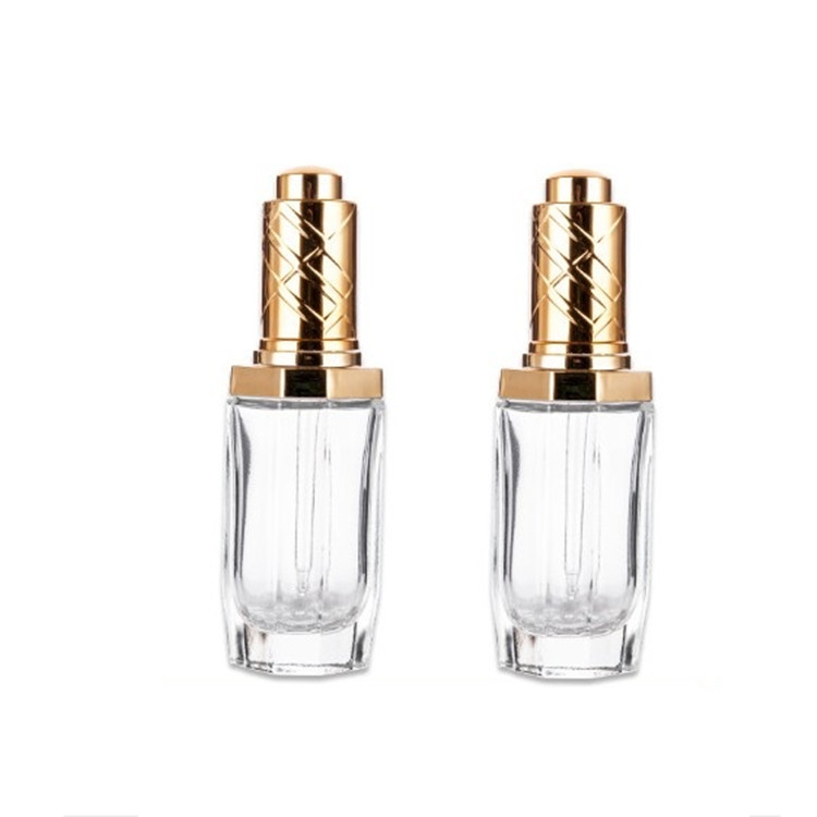 High-end 1 oz Clear Octagonal glass dropper bottle with golden/silver button pump for essence serum with pipette 30 ml