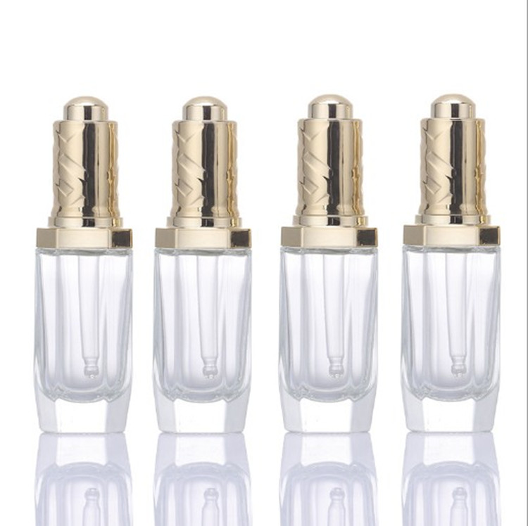 High-end 1 oz Clear Octagonal glass dropper bottle with golden/silver button pump for essence serum with pipette 30 ml