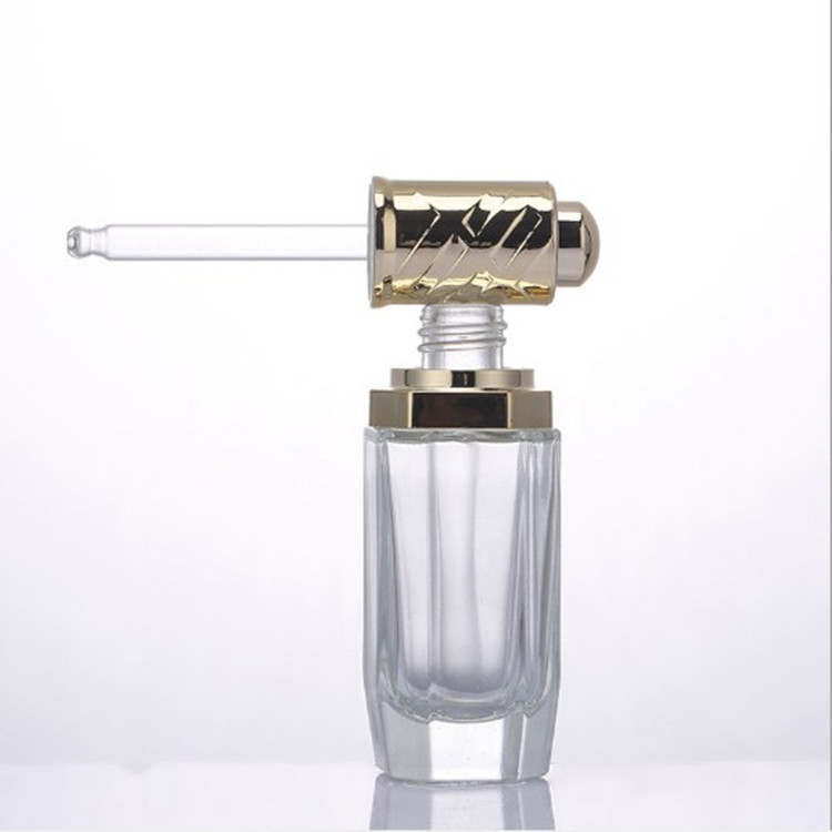 High-end 1 oz Clear Octagonal glass dropper bottle with golden/silver button pump for essence serum with pipette 30 ml
