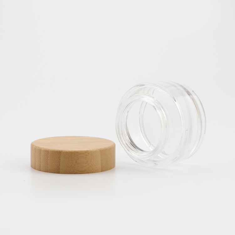 High end 15g 30g 50g empty round facial lotion containers clear glass cosmetics jar with wood child safe cap