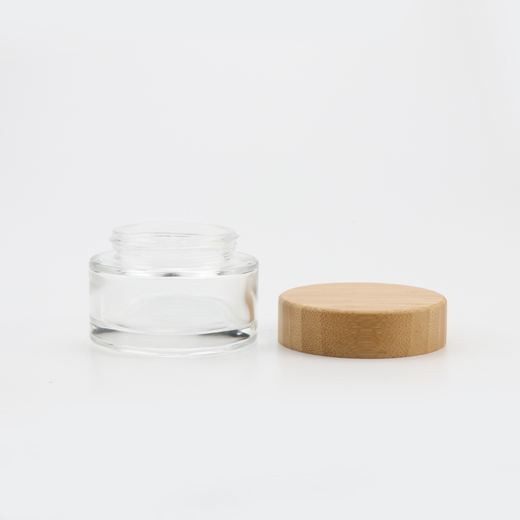 High end 15g 30g 50g empty round facial lotion containers clear glass cosmetics jar with wood child safe cap