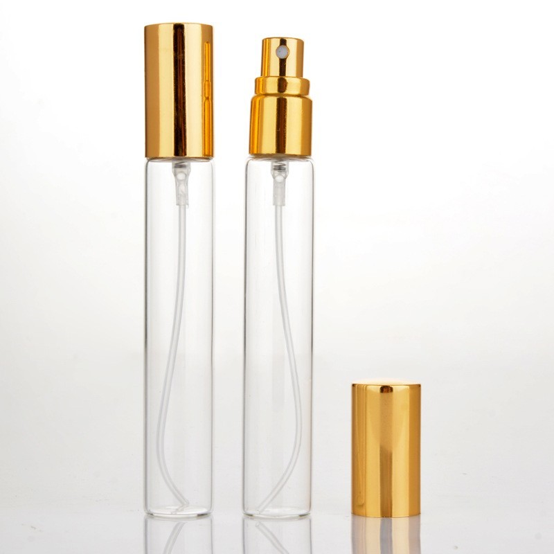High-end custom 10ml clear glass cosmetic sample sub bottle Round tube fragrance bottle with spray cover