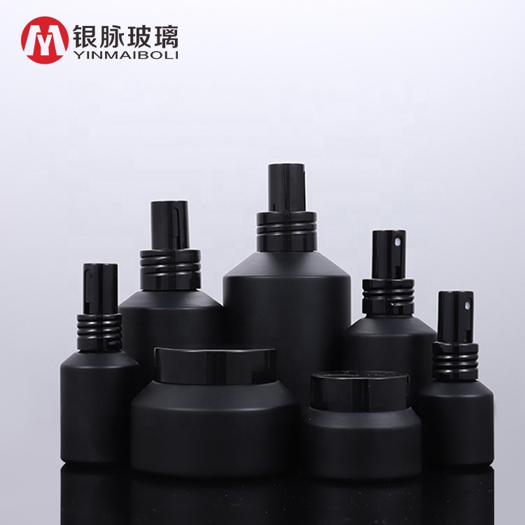High end frosted matte black oblique shoulder glass bottles with pump spray lid