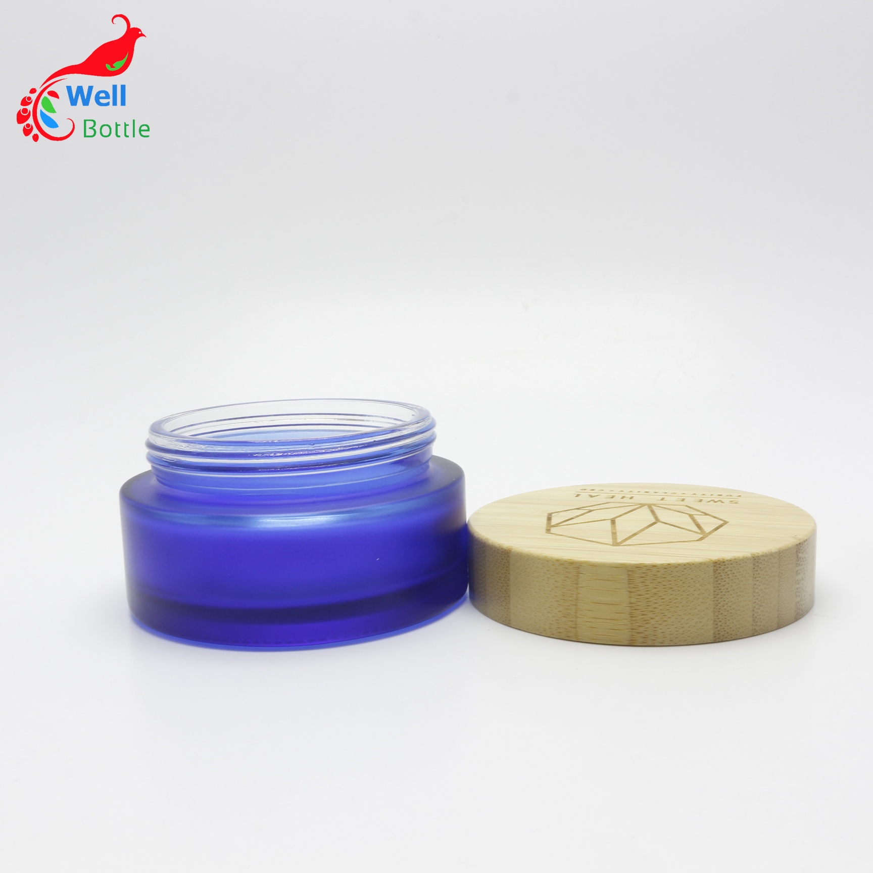 High fashion biodegradable cosmetic packaging 50ml frosted blue glass jar with bamboo lid for massage cream J120E