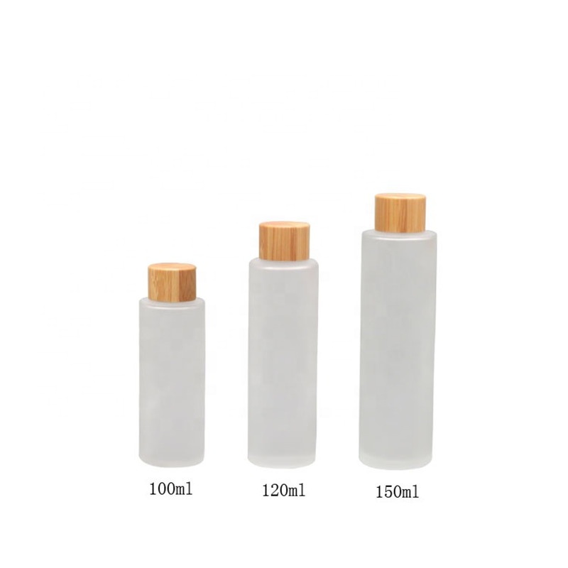 High grade 100ml 120ml 150ml clear / frosted glass cosmetic toner bottle with screw bamboo cap