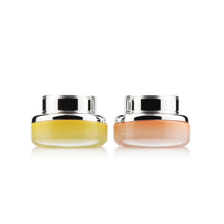High grade 50ml empty oval yellow cosmetic packaging face cream glass jar with silver plastic cap for personal care