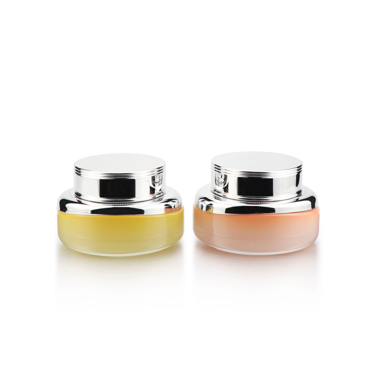 High grade 50ml empty oval yellow cosmetic packaging face cream glass jar with silver plastic cap for personal care