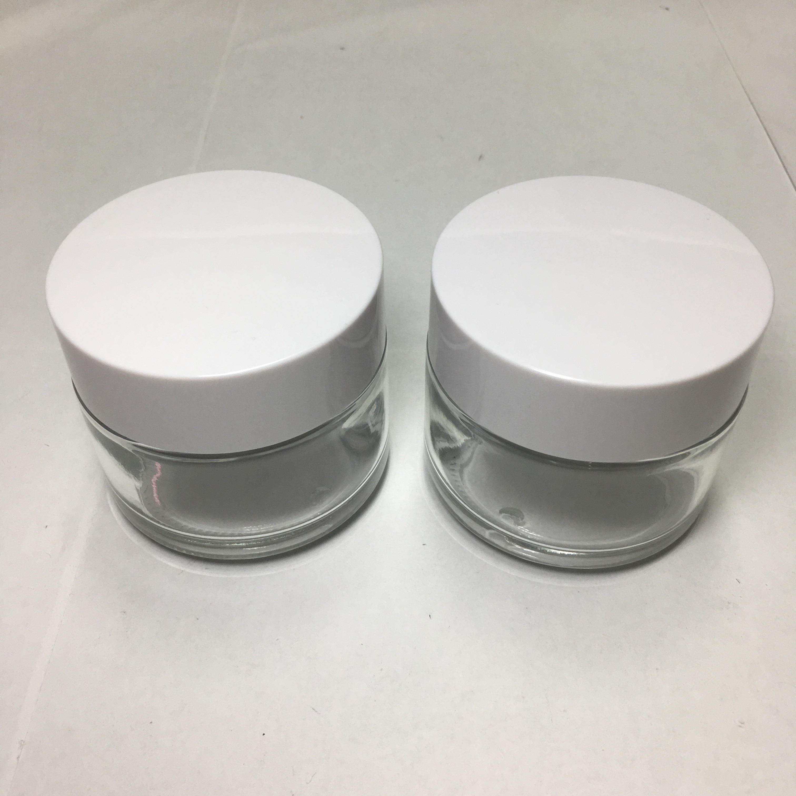 High quality 100g Transparent Cream glass jar for cosmetic packaging