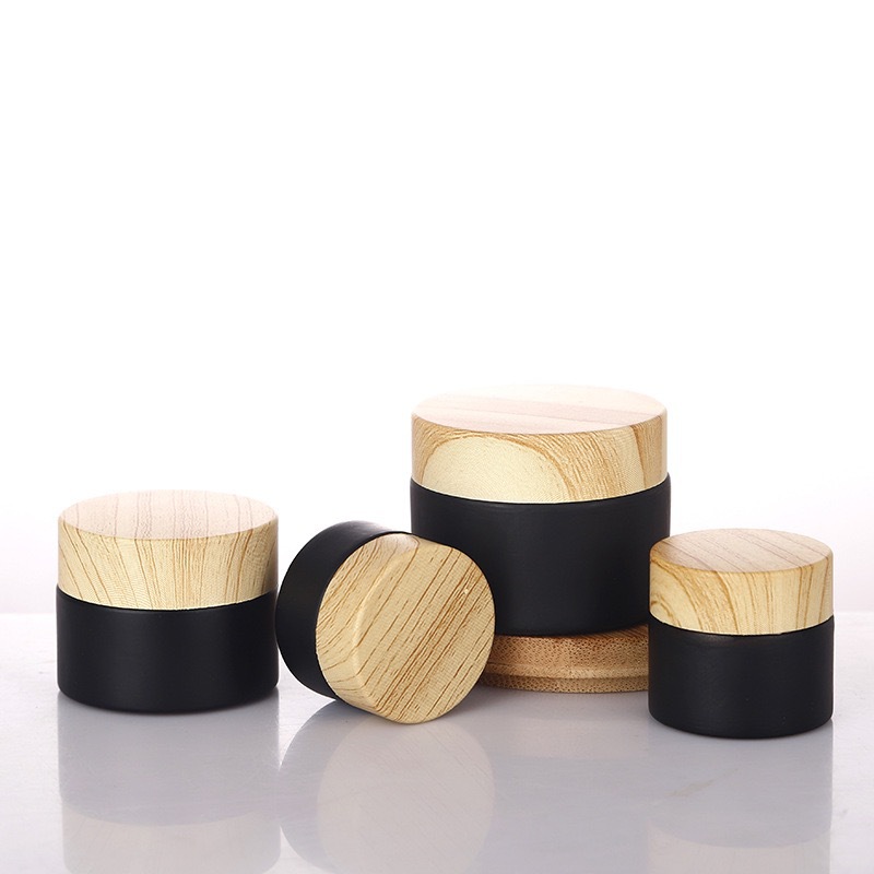 High quality 10g 20g 30g 50g jars glass round wholesale glass jars with wood lid