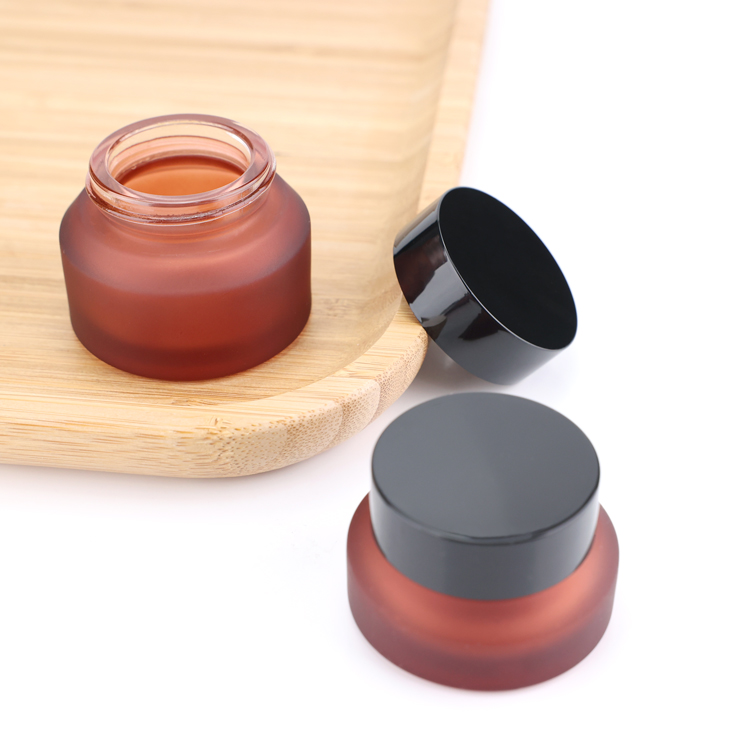 High quality 15 30 50g 0.5 1 1.7 oz frosted red slant shoulder smell proof cosmetic glass cream Jars with black screw cap