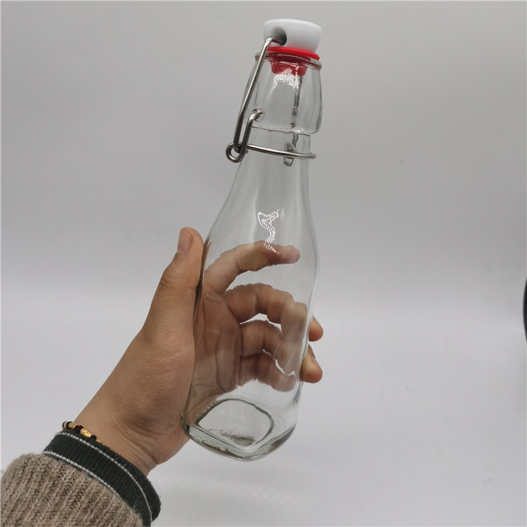 High quality 250ml glass juice bottle water bottle with swing top lid