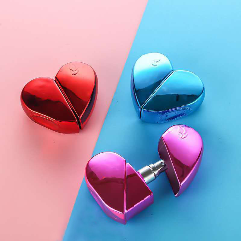 High quality 25ml heart shape mini portable travel refillable pump sprayer perfume bottle for perfume