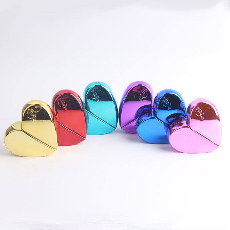 High quality 25ml heart shape mini portable travel refillable pump sprayer perfume bottle for perfume