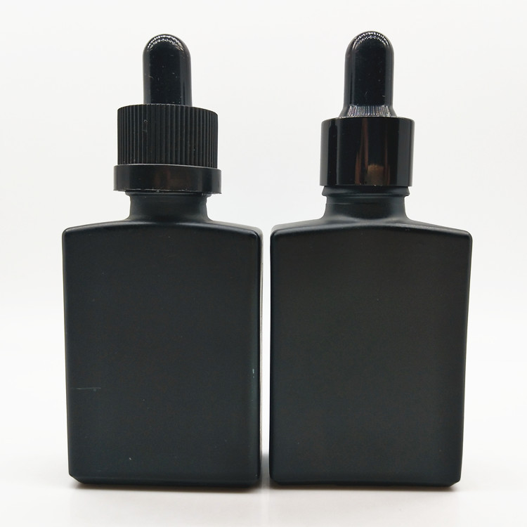 High quality 30ml Flat square matte black glass essential oil bottle with dropper for cosmetics