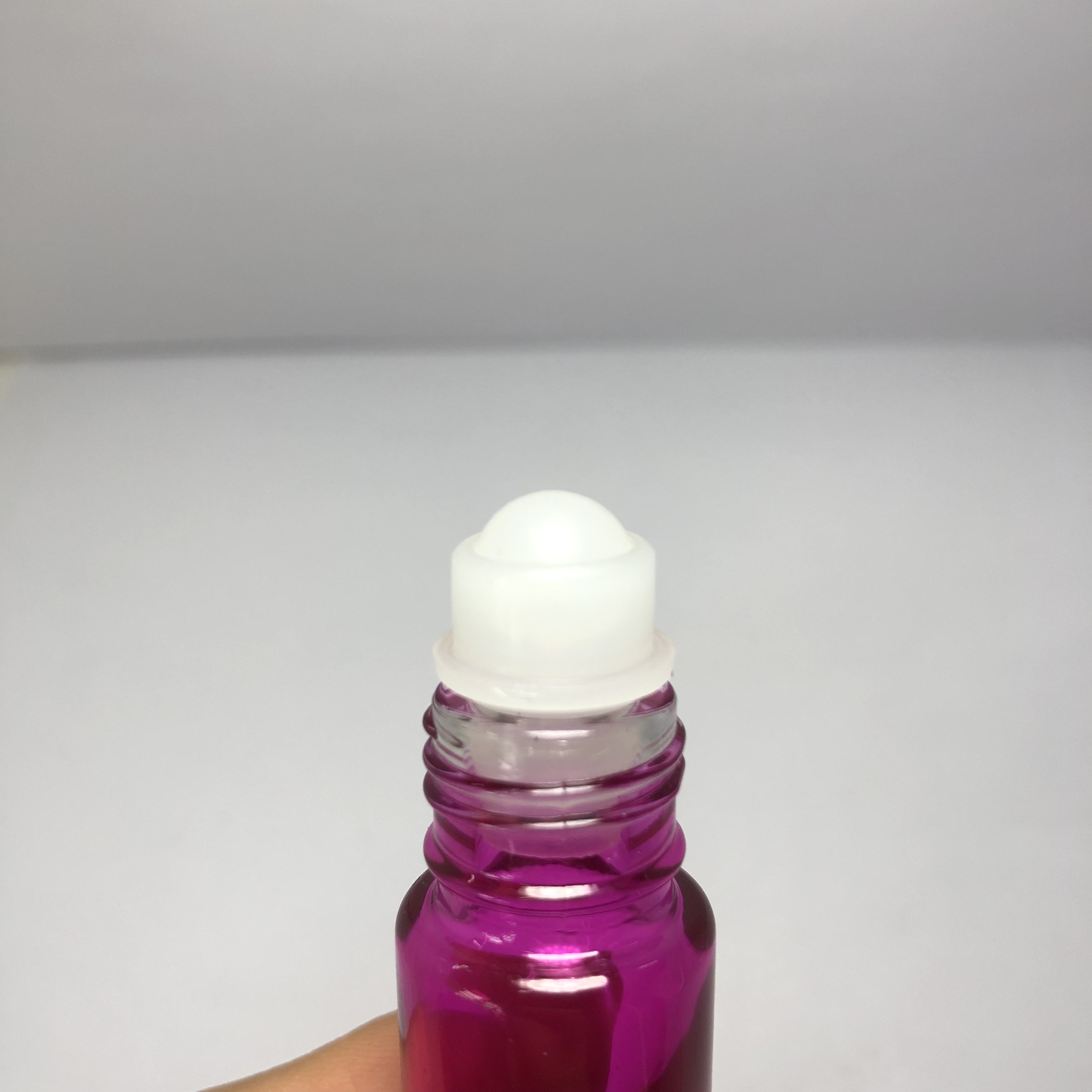 High quality 5ml glass roll on perfume pink color sprayed bottle with plastic roller and silver aluminum cap wholesale