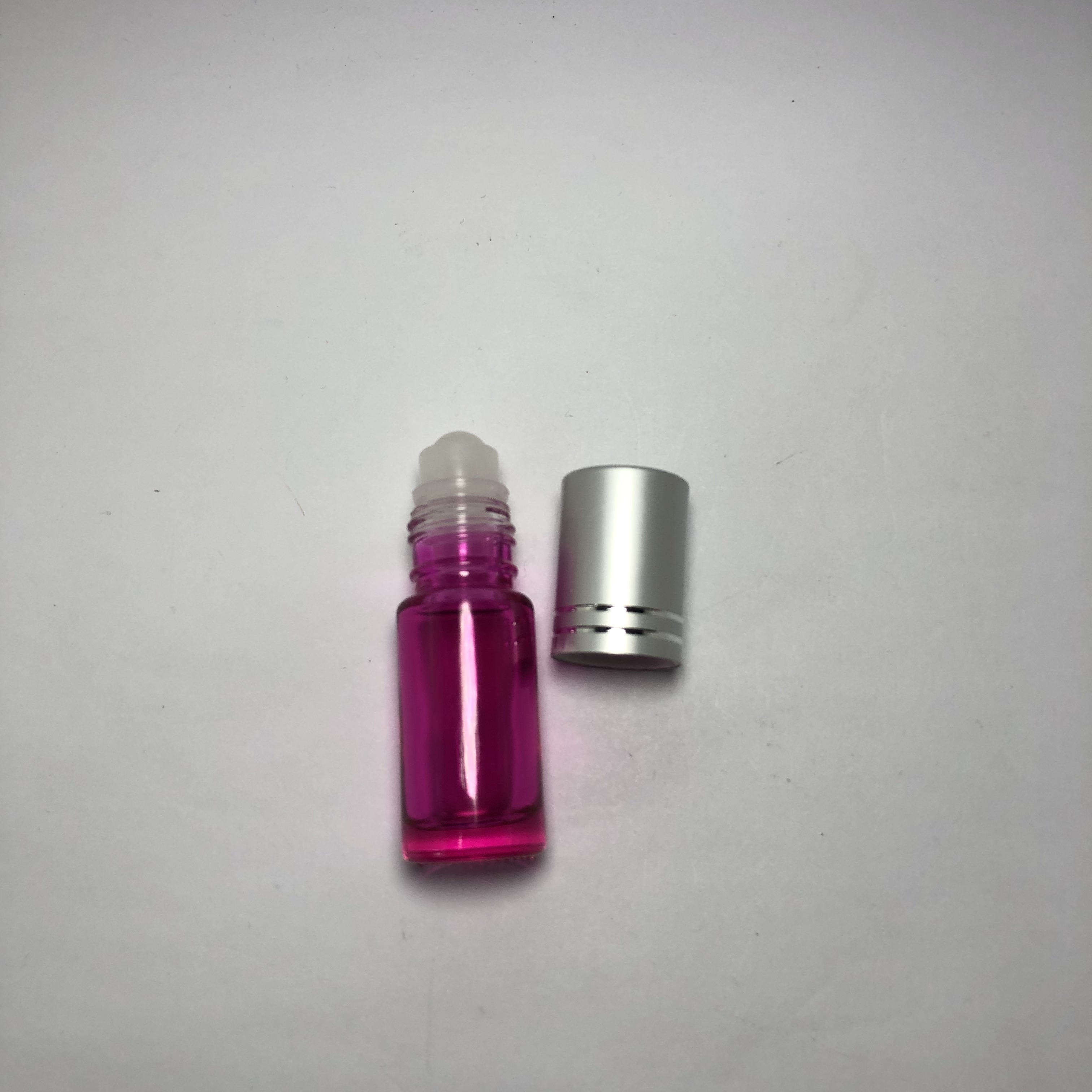 High quality 5ml glass roll on perfume pink color sprayed bottle with plastic roller and silver aluminum cap wholesale