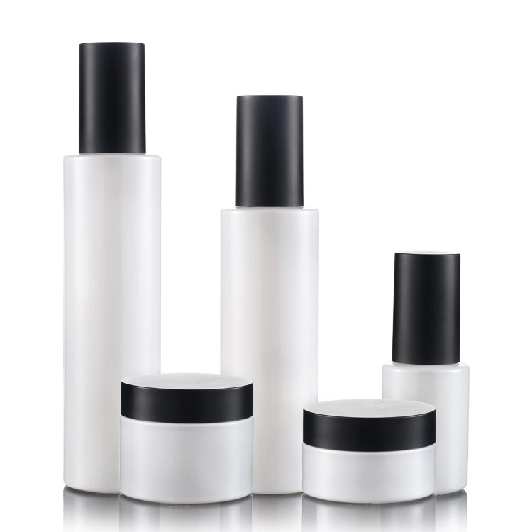High quality Pearl white cosmetics pump glass bottle 30ml100ml120ml and 30g 50g cream jar set with matte black cap