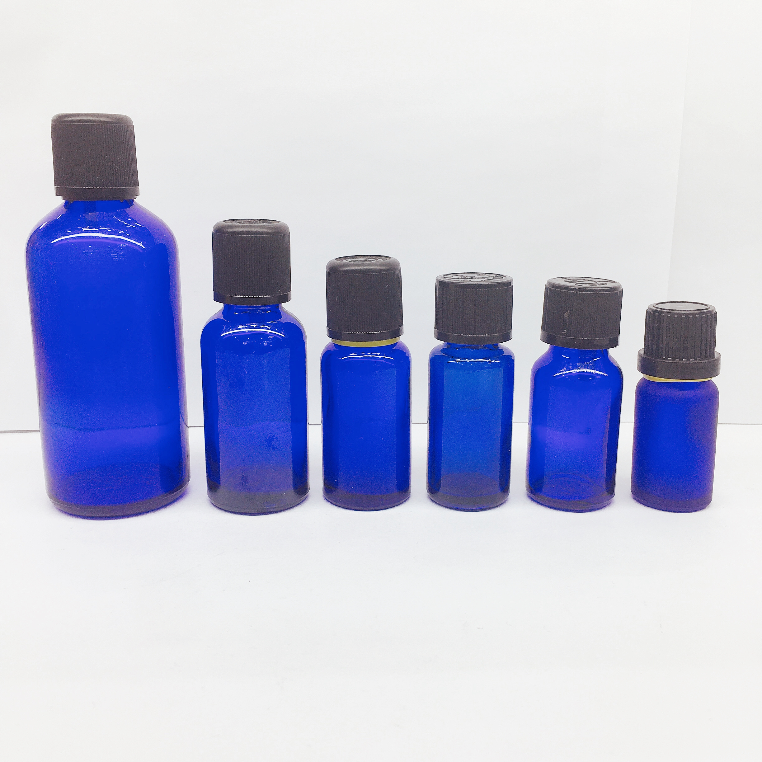 High quality blue essential oil bottle with black cap Complete specifications