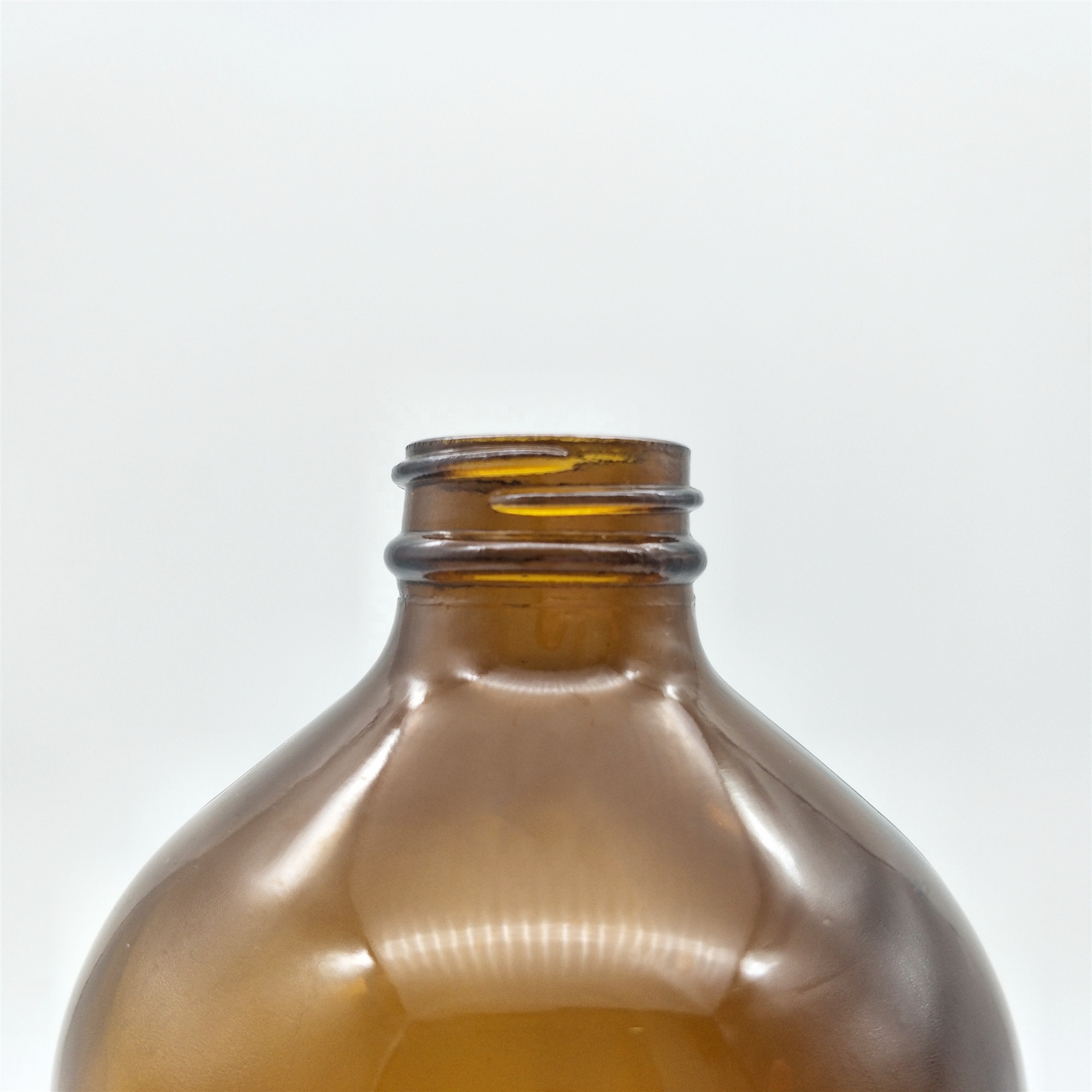 High quality borosilicate glass bottle 32oz amber boston round glass bottle