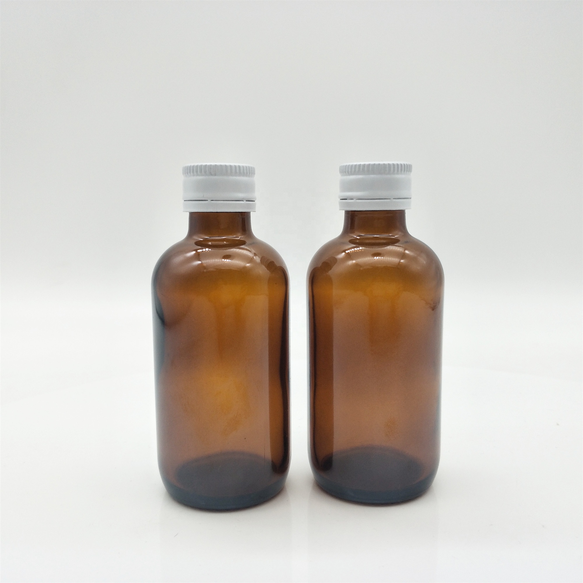 High quality boston round amber glass bottle tamper proof cap with aluminum ROPP caps