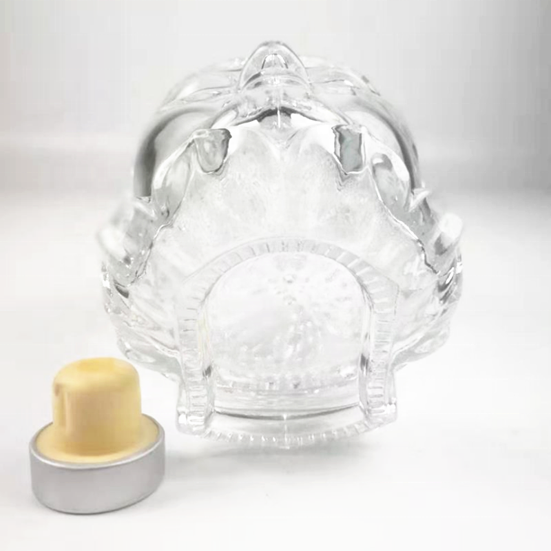 High quality buddha head shape vodka / wine / tequila / gin glass bottle 750ml with stopper lid