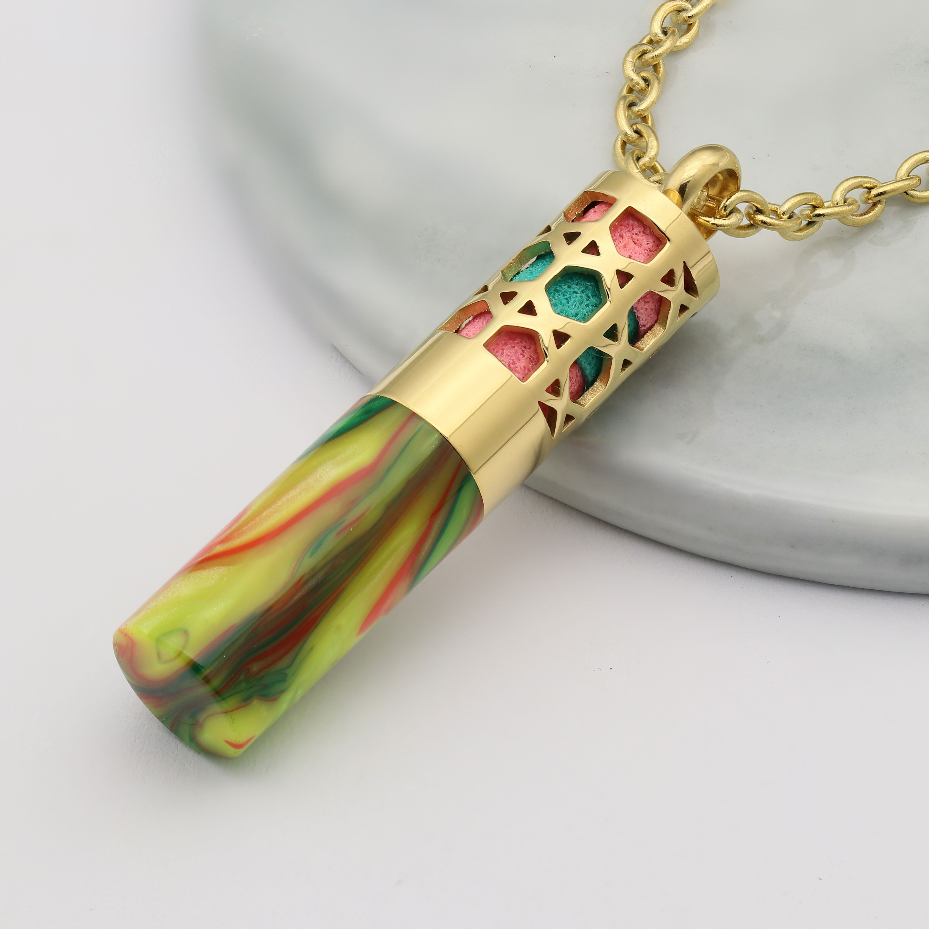 High quality coloured resin has chain perfume bottles.