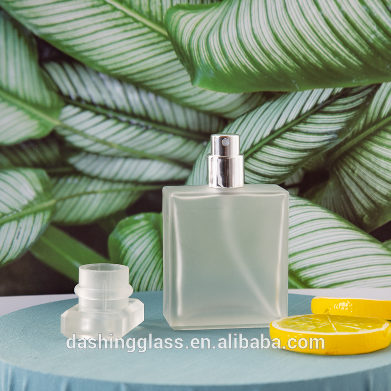 High quality custom made 50ml crimp top square empty clear frosted perfume glass bottle