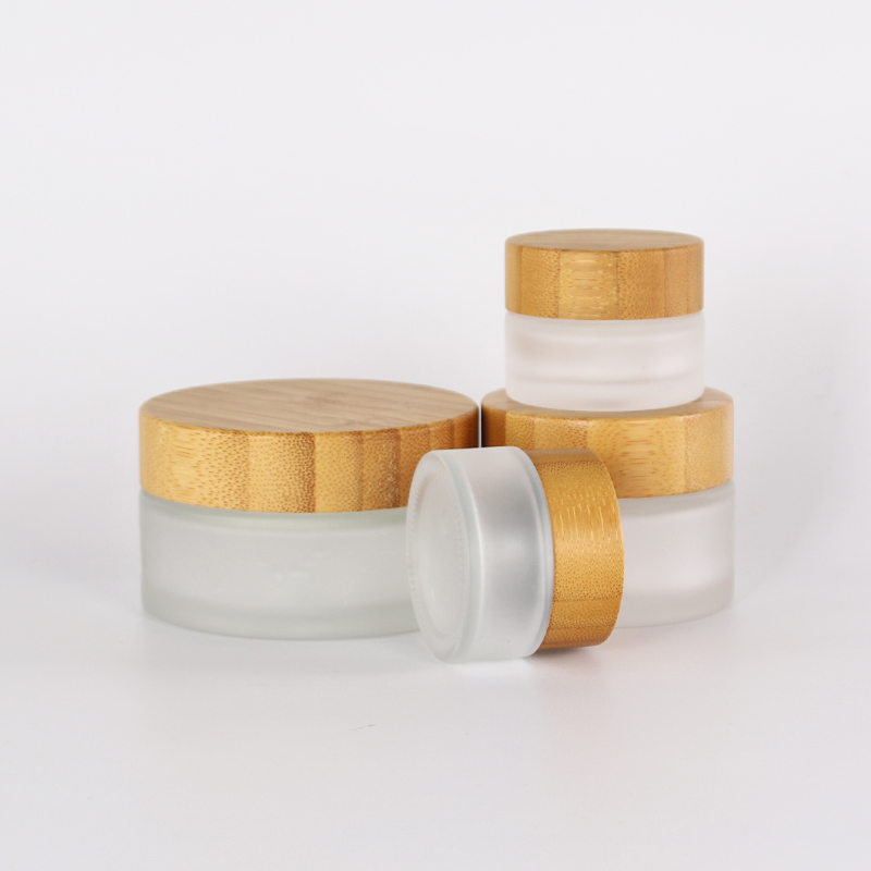 High quality eco-friendly clear frosted glass jar with bamboo wood lid for body cream