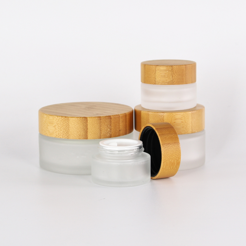 High quality eco-friendly clear frosted glass jar with bamboo wood lid for body cream