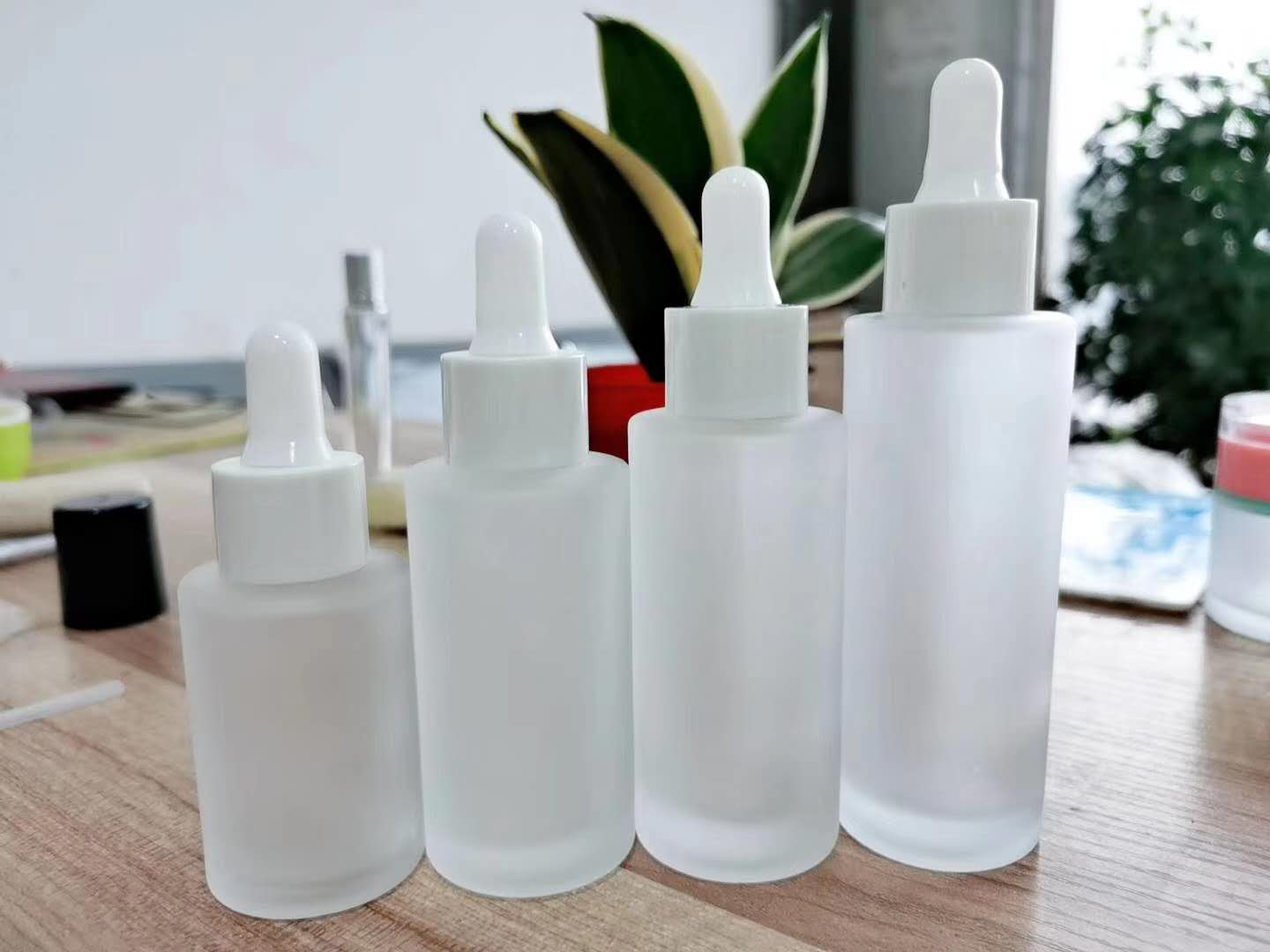 High quality empty 30ml 60ml flat shoulder essential oil dropper glass bottles