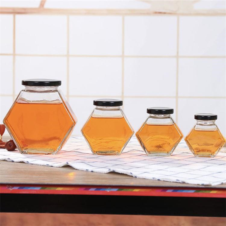 High quality glass bottle honey packing hexagonal jar