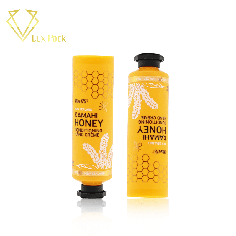 High quality luminous yellow empty hand cream tube PE plastic cream cosmetic tube with octagon screw cap