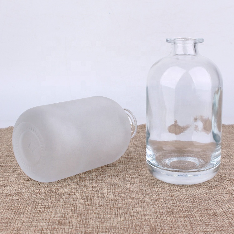 High quality round 250ml 500ml wine liquor glass bottle with synthetic cork stopper