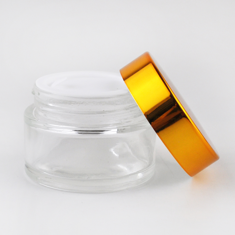 High quality round bottle clear glass jar with gold aluminum lid cosmetics bottle container