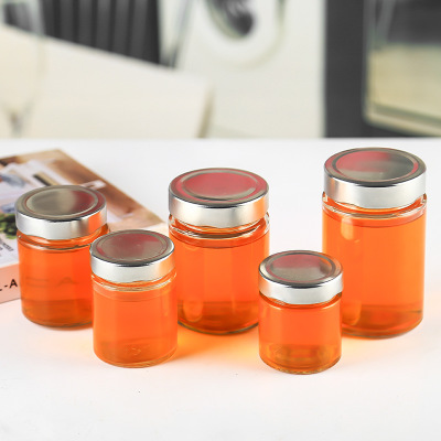 High quality round food grade honey jar gold lid sealed glass storage jar