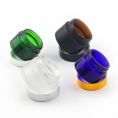 High quality small cosmetic cream round green 30ml 1 oz glass jar with green amber  aluminum screw top lid