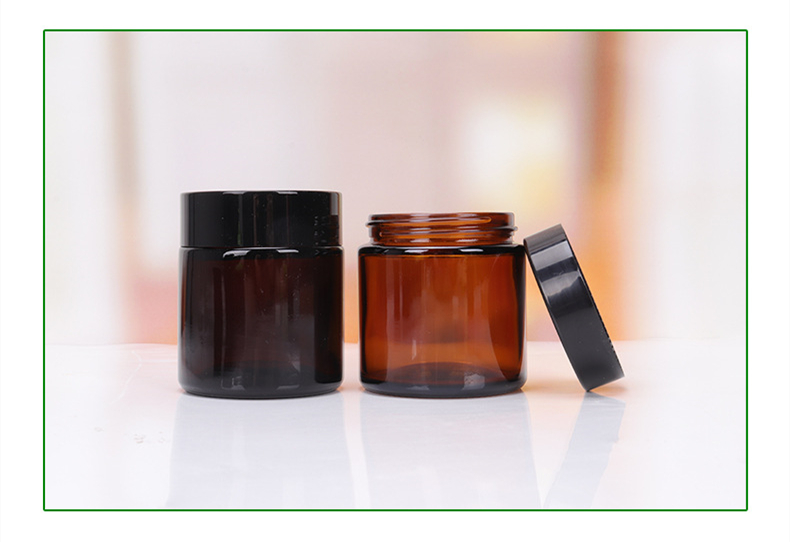 High quality small cosmetic cream round green 30ml 1 oz glass jar with green amber aluminum screw top lid