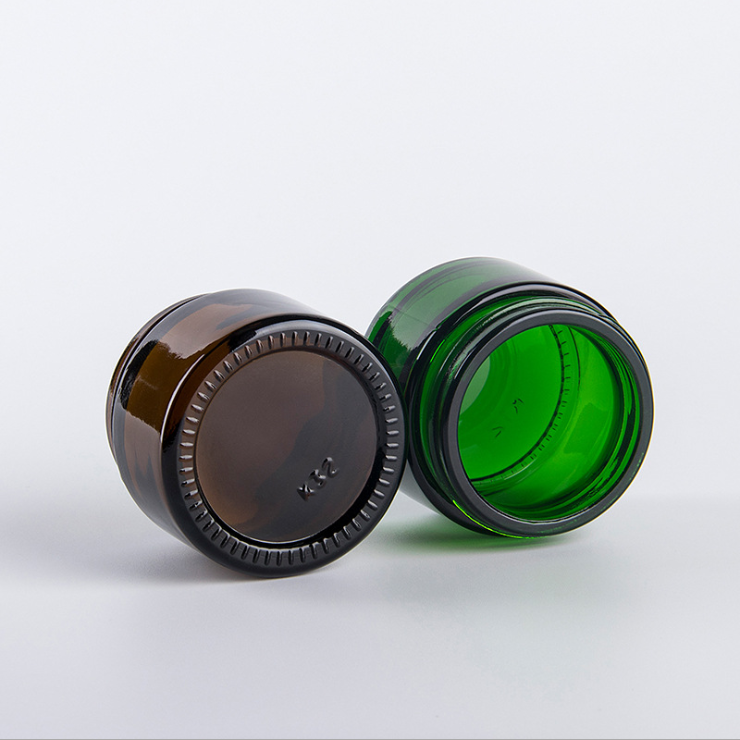 High quality small cosmetic cream round green 30ml 1 oz glass jar with green amber aluminum screw top lid